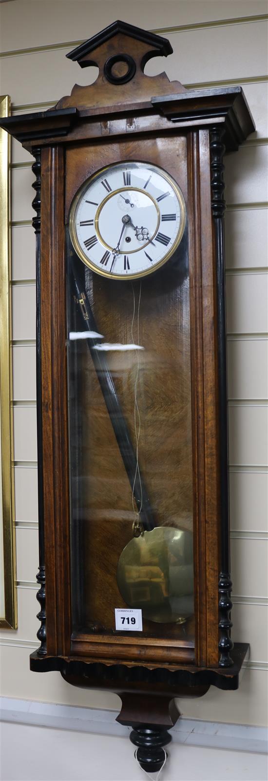 A 19th century walnut and ebonised Vienna wall timepiece, H.44in.